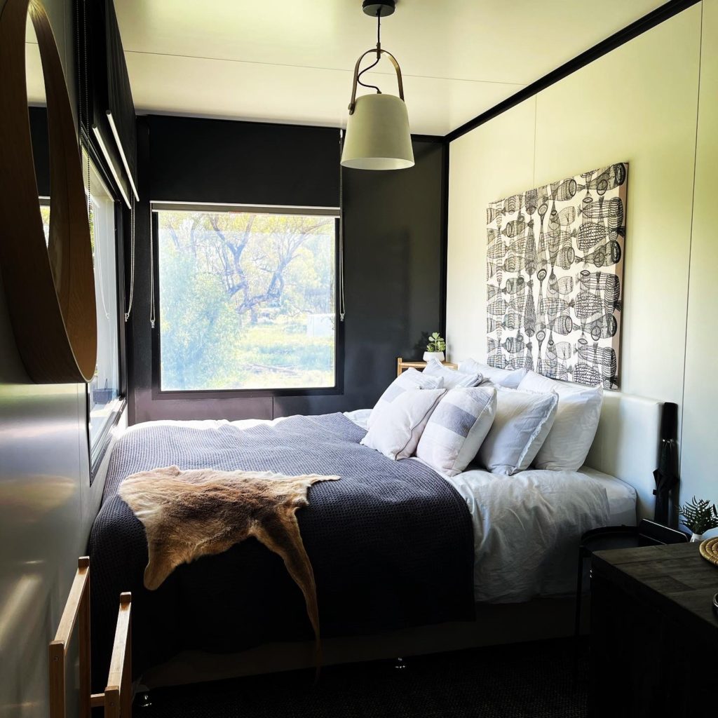 Accessible Accommodation Suite  bedroom at Callubri Station with outback views through large window.