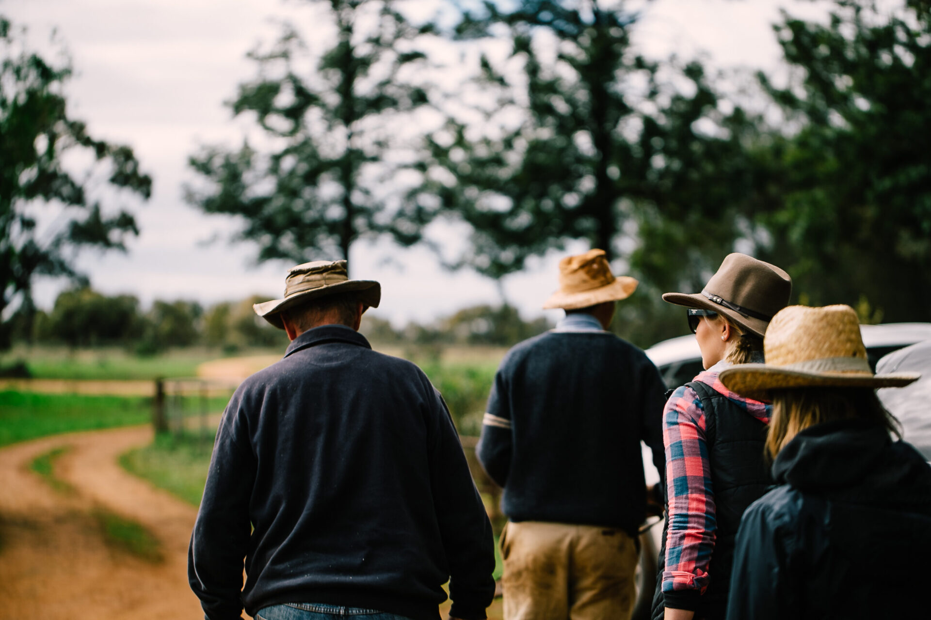 Guests in cowboy hats explore outback NSW during a guided Callubri Station experience.