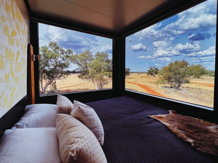 Sky Suite bedroom at Callubri Station overlooking Central West NSW outback landscape.