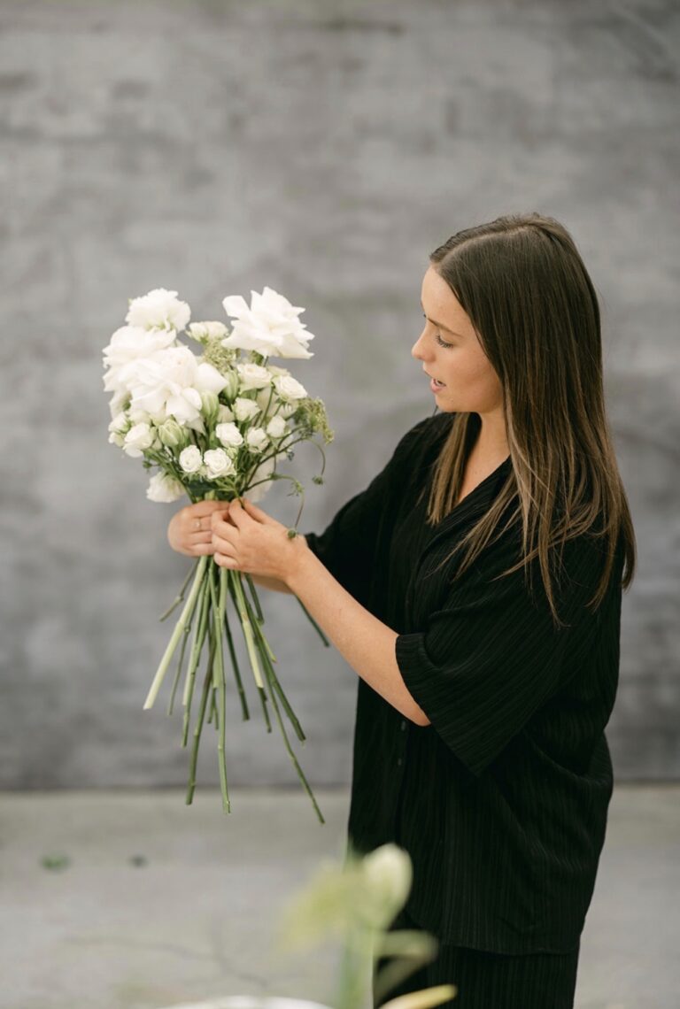 Florist holding a posie of flowers