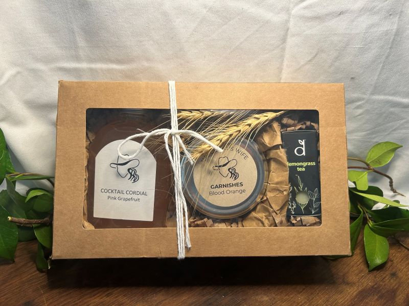 Gift box with cocktail ingredients and tea